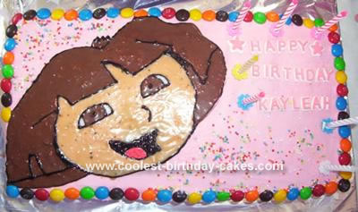 Dora and Boots cupcake cake - Decorated Cake by Tiffany - CakesDecor